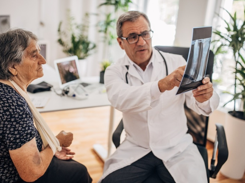 Woman looks at x-ray