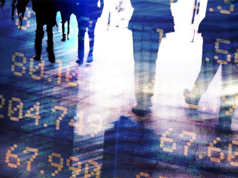 Stock market numbers transposed over figures walking