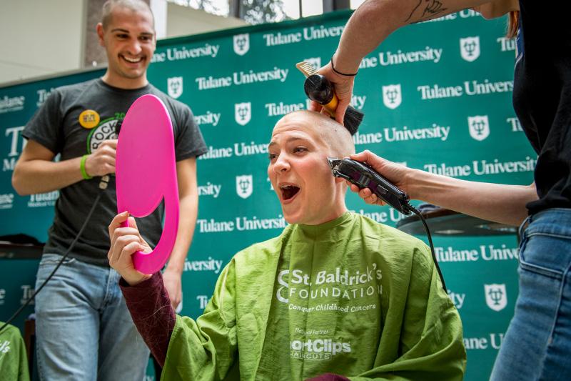  Med students go bald in support of childhood cancer research.