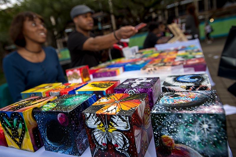 Artful boxes by artist Shelton LeBron create an eye-catching display. Black Art Market turns Pocket Park into a festive bazaar.