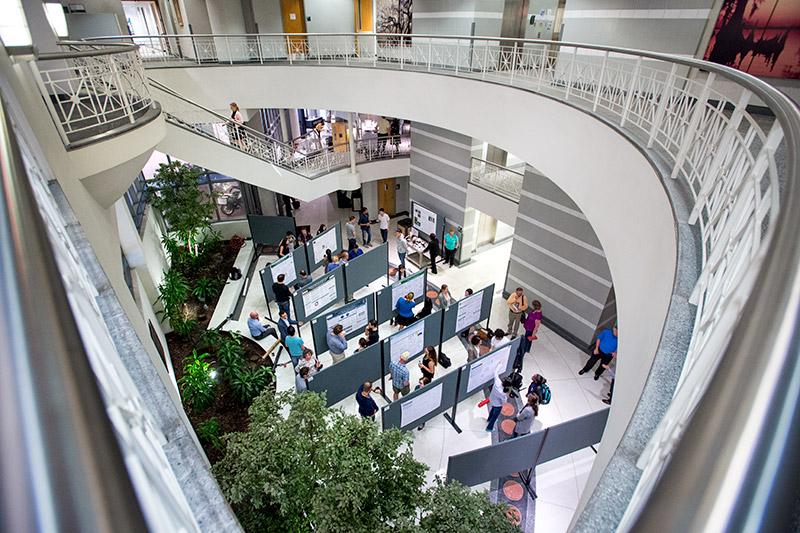 Each year, the event takes place in the atrium of the J. Bennett Johnston building. Researchers come together for annual health science poster presentations.