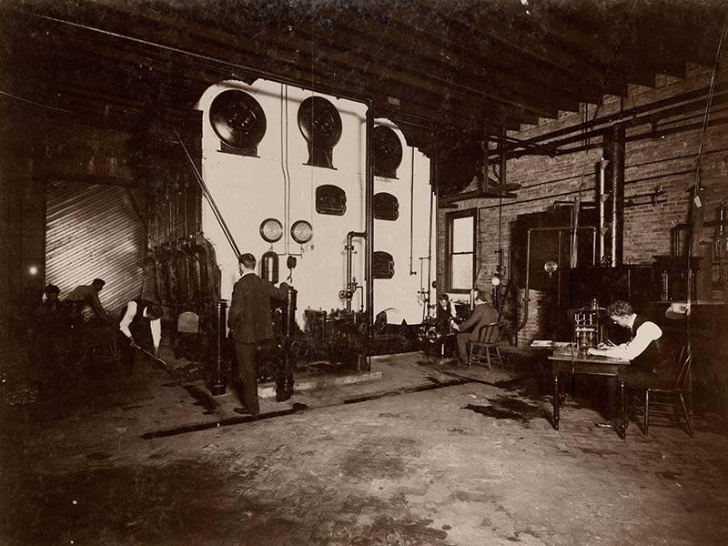 Mechanic arts students get some hands-on education in the late 19th century.