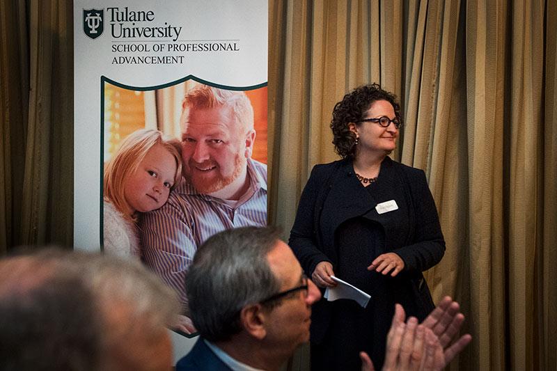Suri Duitch, Dean of the School of Professional Advancement looks on as the new name and vision for the school is announced at an event on Thursday. 