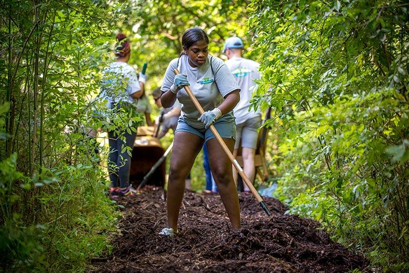 More than 600 Tulane staffers from the New Orleans, North Shore and Mississippi campuses volunteered to spread out across the region and help local non-profits for the Wave of Green Day of Service.