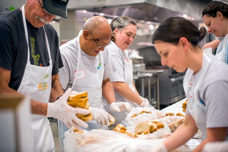 More than 600 Tulane staffers from the New Orleans, North Shore and Mississippi campuses volunteered to spread out across the region and help local non-profits for the Wave of Green Day of Service.