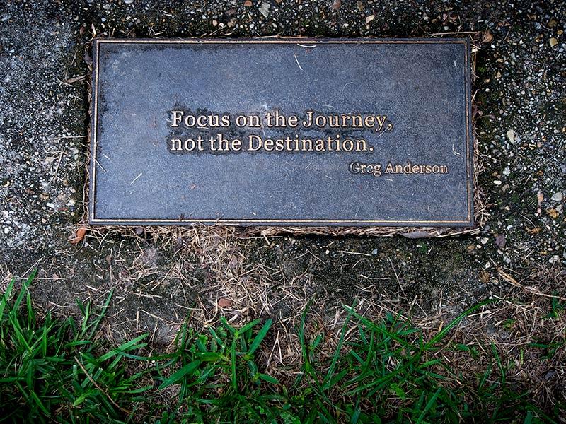 In front of each bench is a plaque with words of encouragement and optimism. The Labyrinth in Audubon Park is a space for relaxation and contemplation.