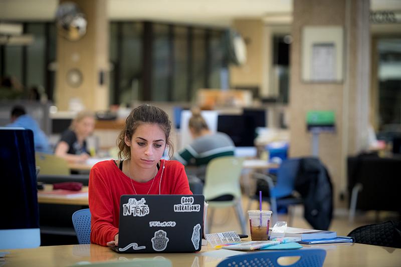 With only one day of classes behind her, first-year student Reagan Anthony says, “I have a lot of work to do” as she spreads her books across a table in the Howard-Tilton Memorial Library. Members of the Tulane community took advantage of a day off Tuesday due to possible heavy rain and flooding from Harvey.