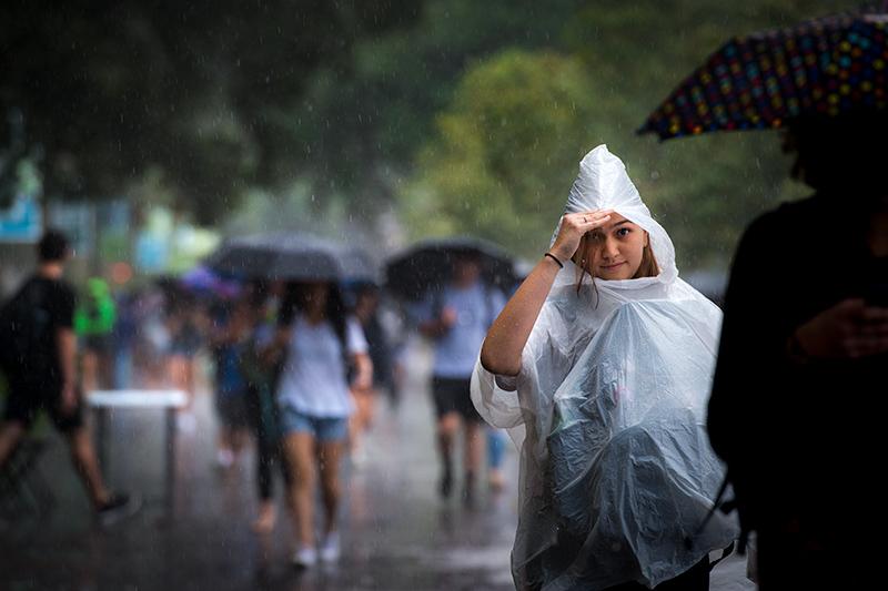 Rainstorm welcomes back students to summertime weather in New Orleans.