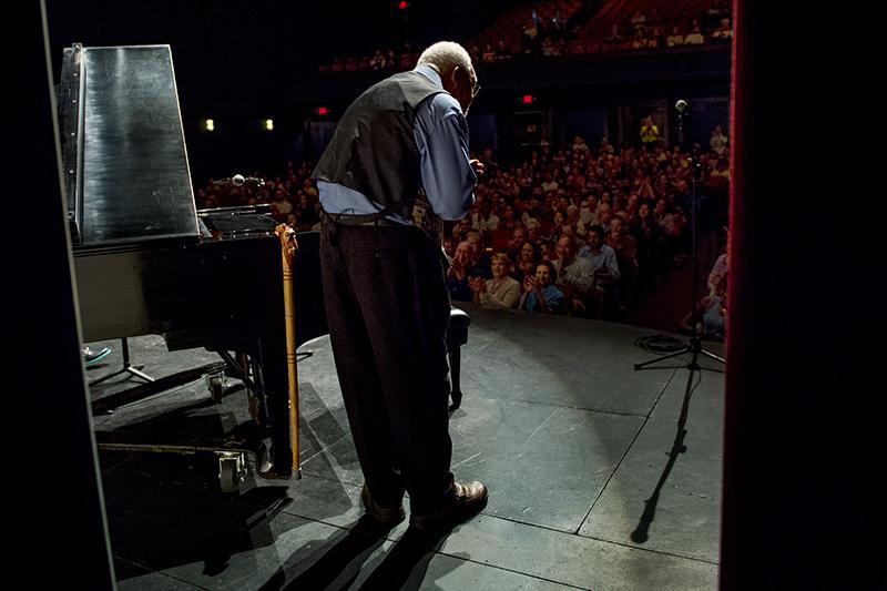 Marsalis greets the audience as he takes the stage at the start of his performance in Dixon Hall. Ellis Marsalis performs at Tulane.