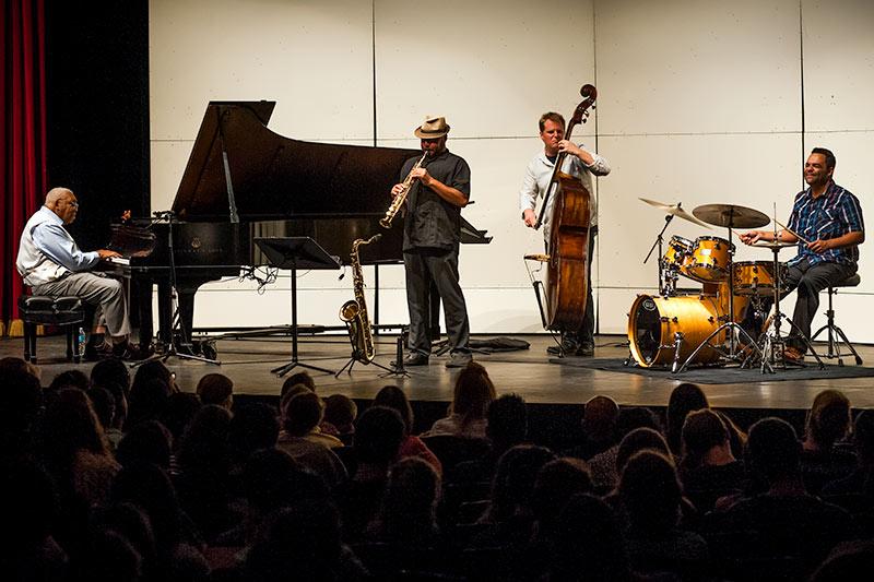 Marsalis, far left, plays with his band, from left, Derek Douget , Jason Stewart and Stephen Gordon.