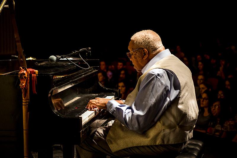 Rapt audience members listen to Ellis Marsalis as he performs a range of jazz styles from early to modern during his annual Tulane performance.