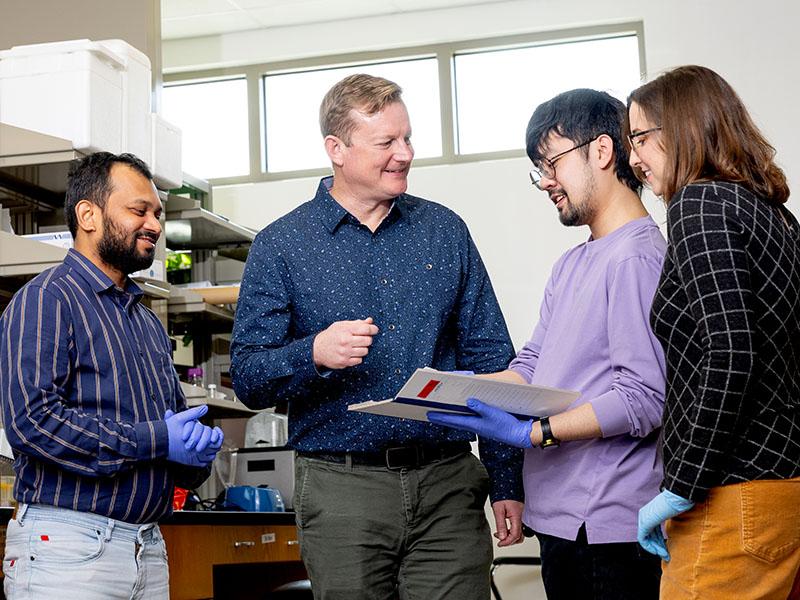 Chandrashekhar Borkar, Jonathan Fadok, Eric Le, and Claire Stelly in the lab