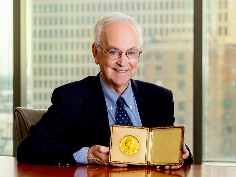Dr. Lee Hamm, senior vice president and dean of Tulane University School of Medicine, with the Nobel Prize