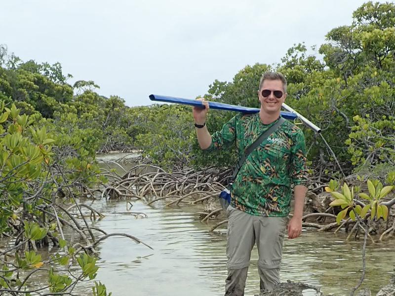 Daniel Friess in a mangrove forest