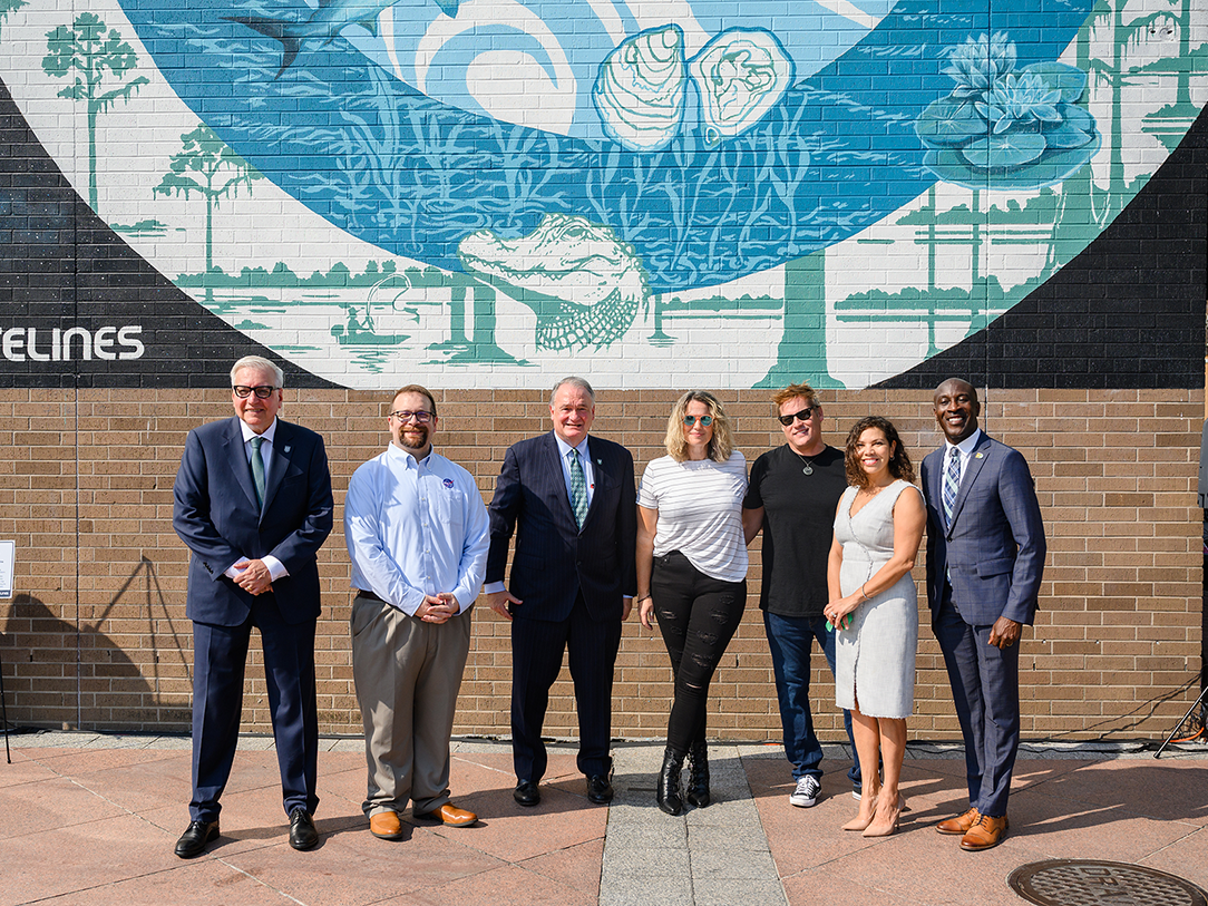 Patrick Norton, Josh Barnes, President Michael A. Fitts, Sheri Philips, Lee Hay, Councilmember Lesli Harris and Davon Barbour