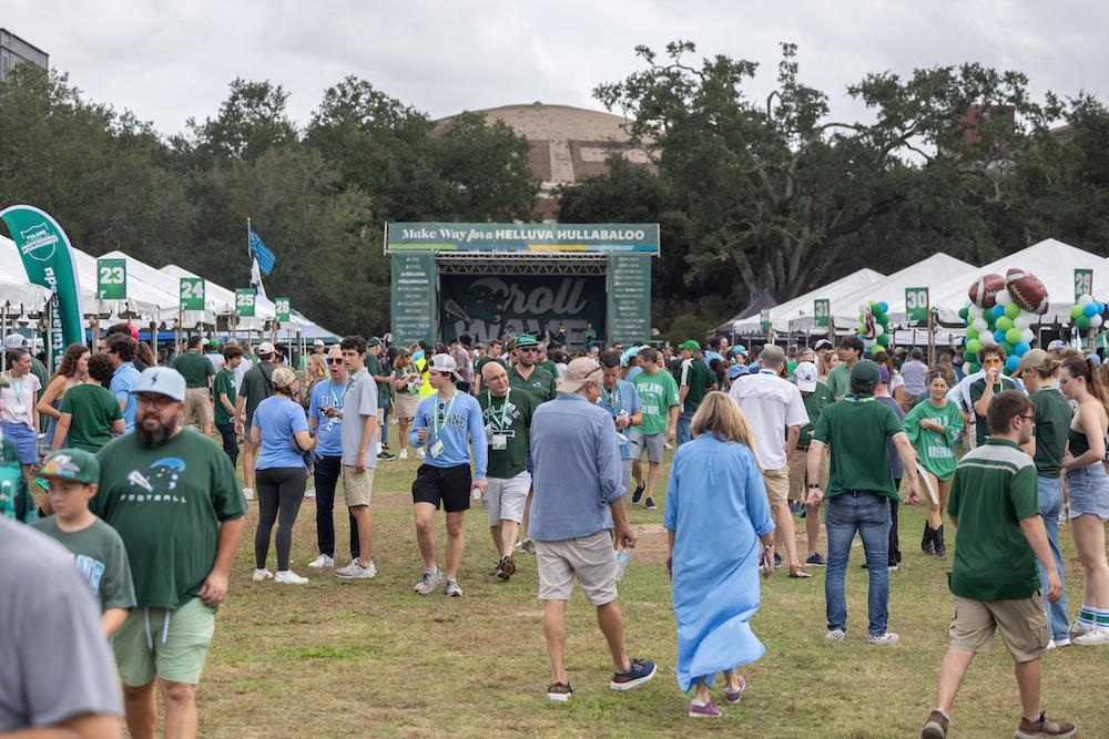 Green Wave fans tailgating on the Berger Family Lawn