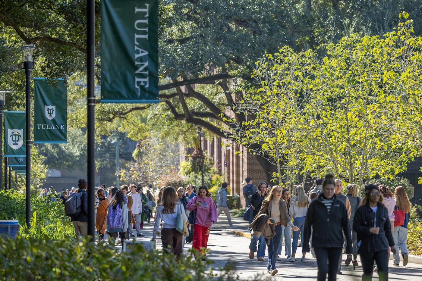 Tulane students walking on uptown campus