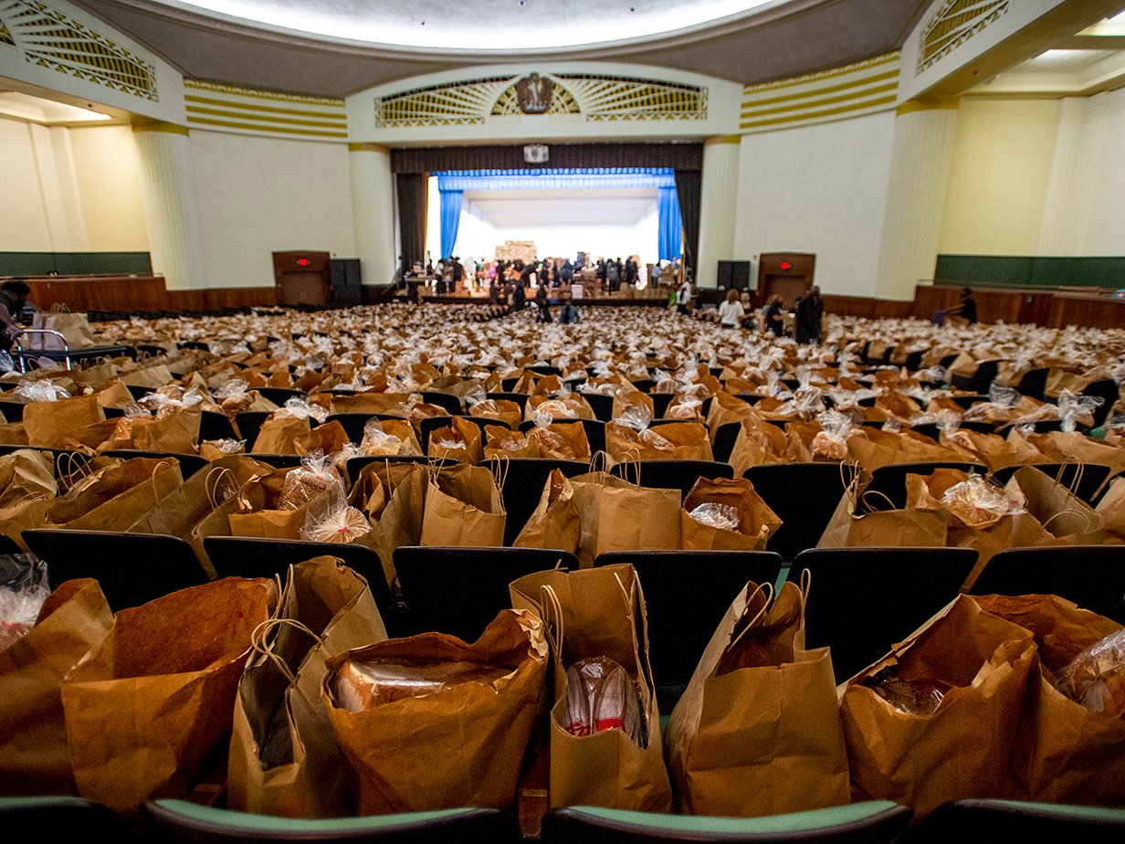 Paper bags full of supplies in McAlister Auditorium