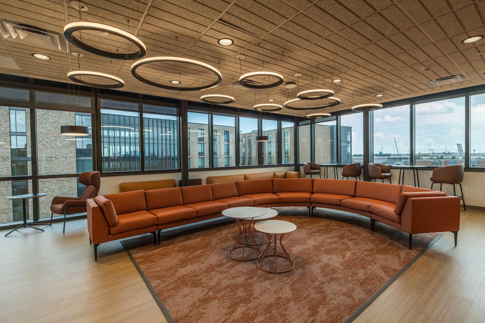 a lounge area with a skyline view in the Bayou and Fogelman residence halls