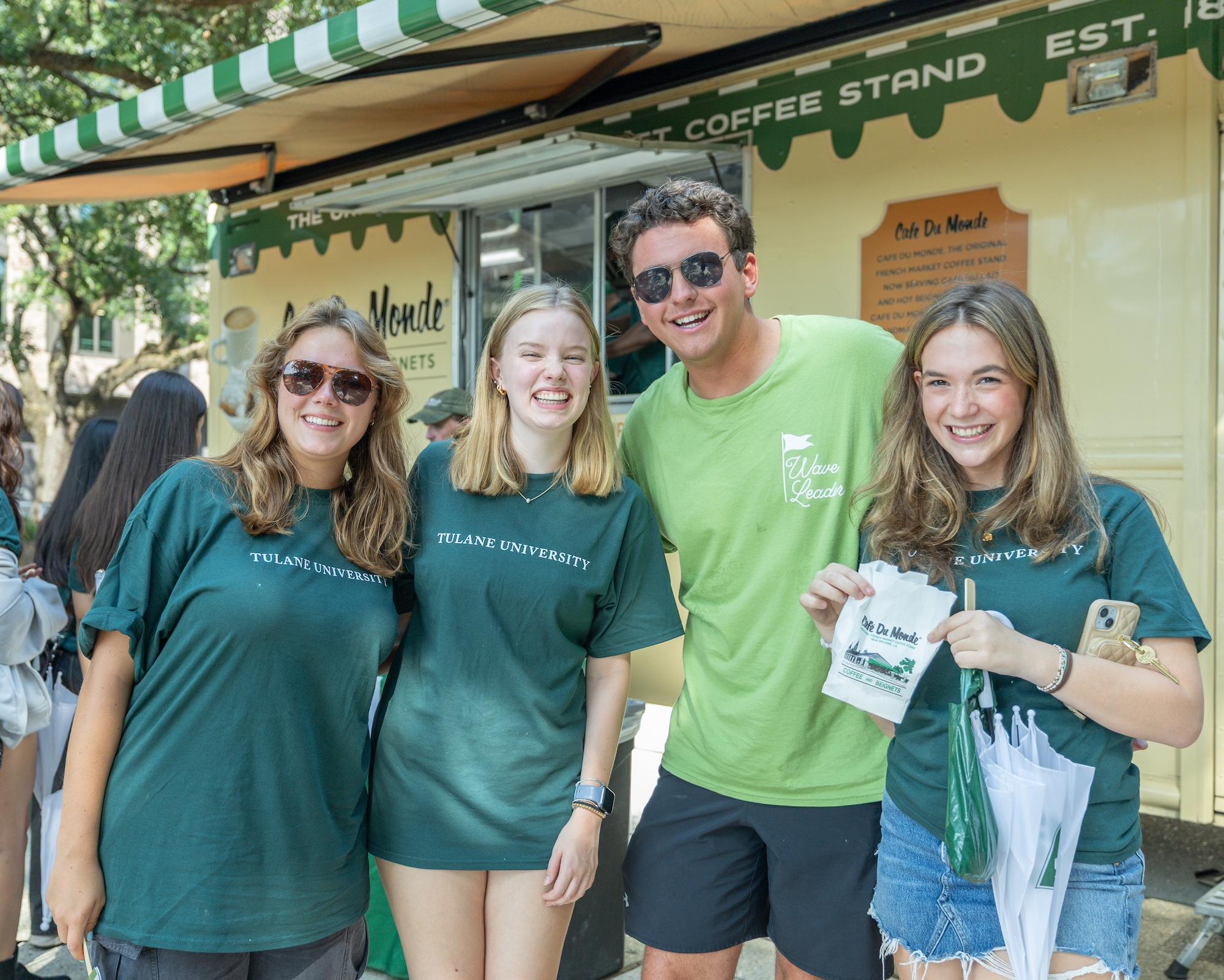 First-year students in front of a Cafe Du Monde truck