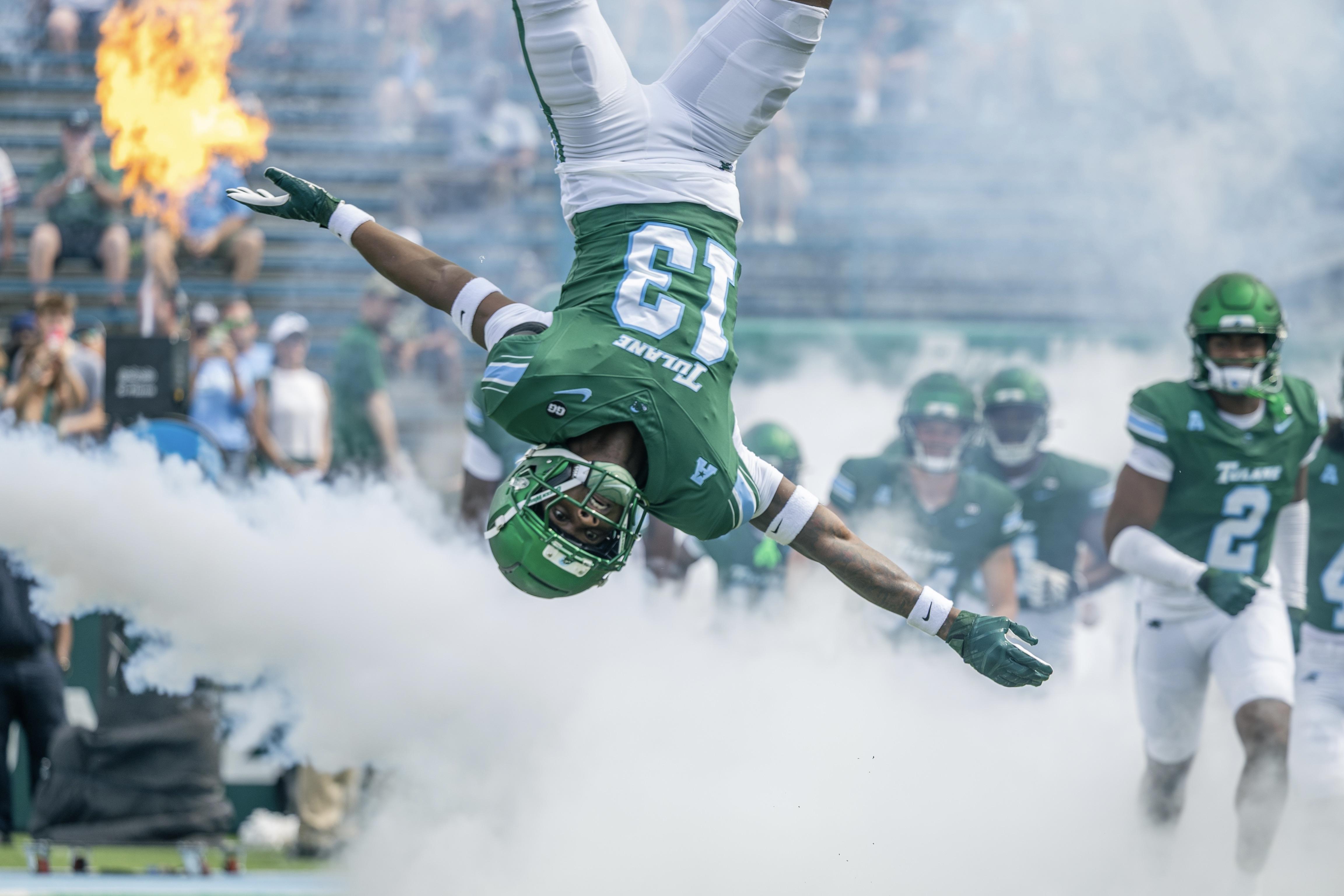 Tulane football player flips upside down