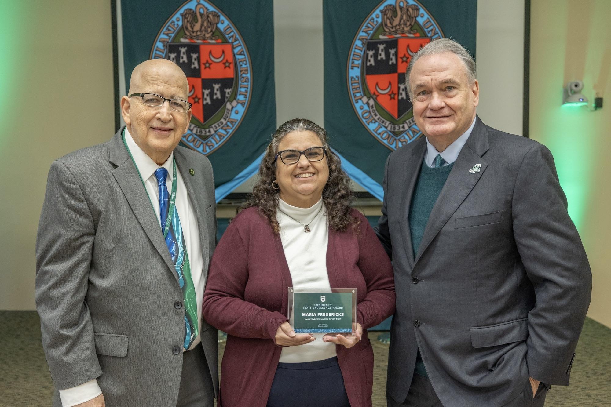 Jay Rappaport, Maria Fredericks, and President Michael A. Fitts