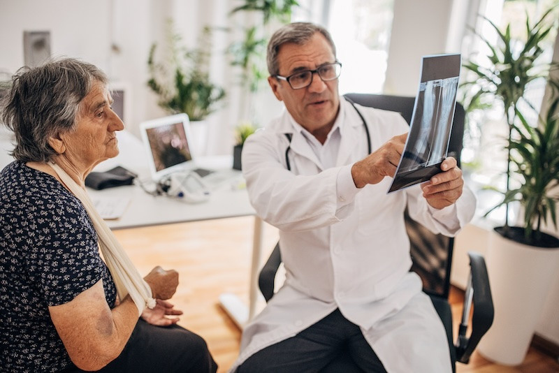 Woman looks at x-ray