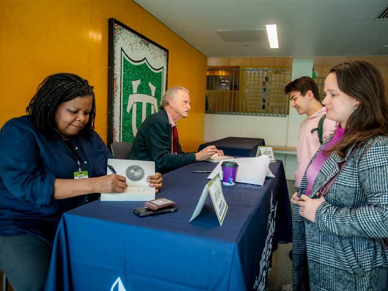 Authors Annette Gordon-Reed and Peter S. Onuf sign books on the first day of the New Orleans Book Festival at Tulane University 2022. 