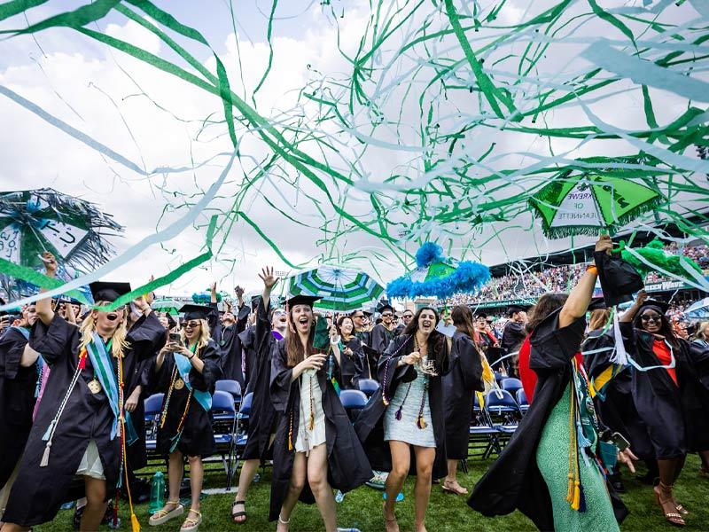 Graduates celebrate after having their degrees conferred at the 2022 Unified Commencement ceremony. (Photo by Rusty Costanza) Graduates celebrate after having their degrees conferred at the 2022 Unified Commencement ceremony. (Photo by Rusty Costanza)