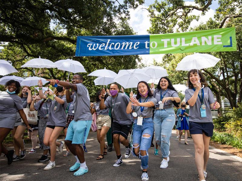 First-year students second-line down McAlister Place after the 2021 President’s Convocation for New Students.