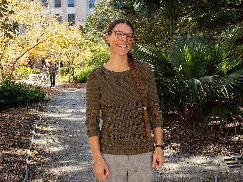 Tulane researcher studying weed invasion. Tulane researcher studying weed invasion.