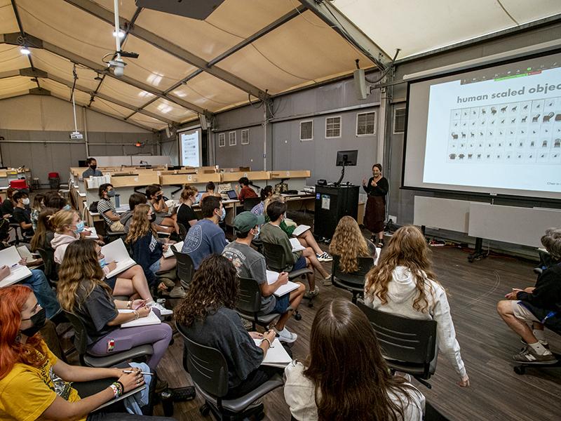 Chair design is discussed during a morning architecture class in on of the temporary classrooms on the Newcomb Quad.