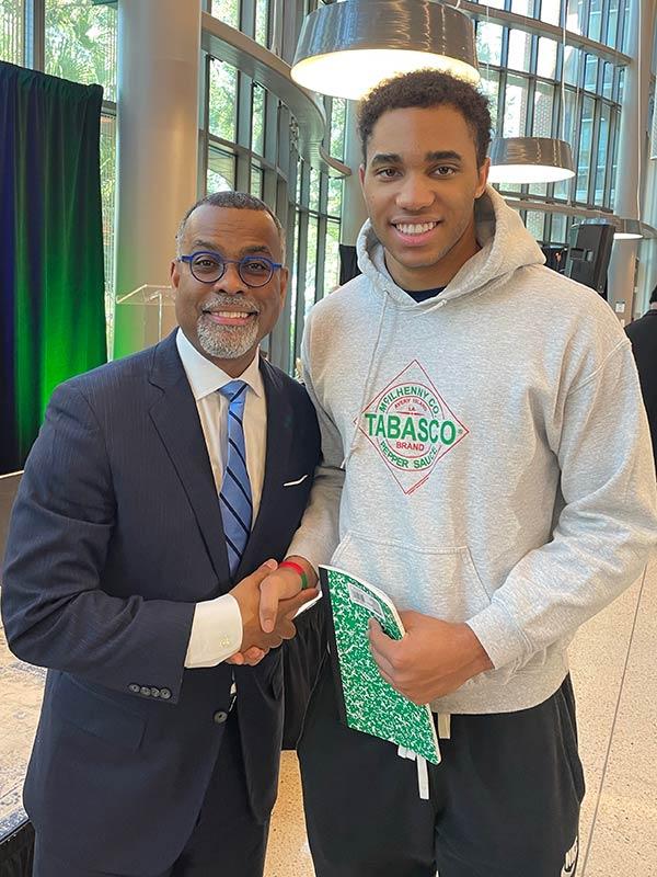 Author Eddie Glaude and Jesuit High School student Joshua Washington at New Orleans Book Festival 2022