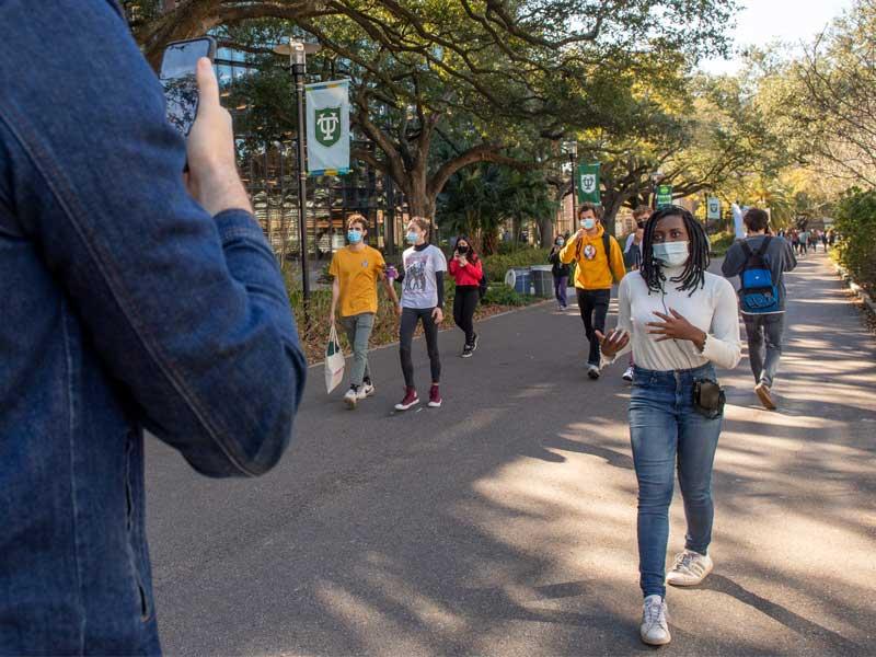 Admission Counselor Jacob Budin films student intern Kyla Denwood giving a virtual campus tour on Zoom.