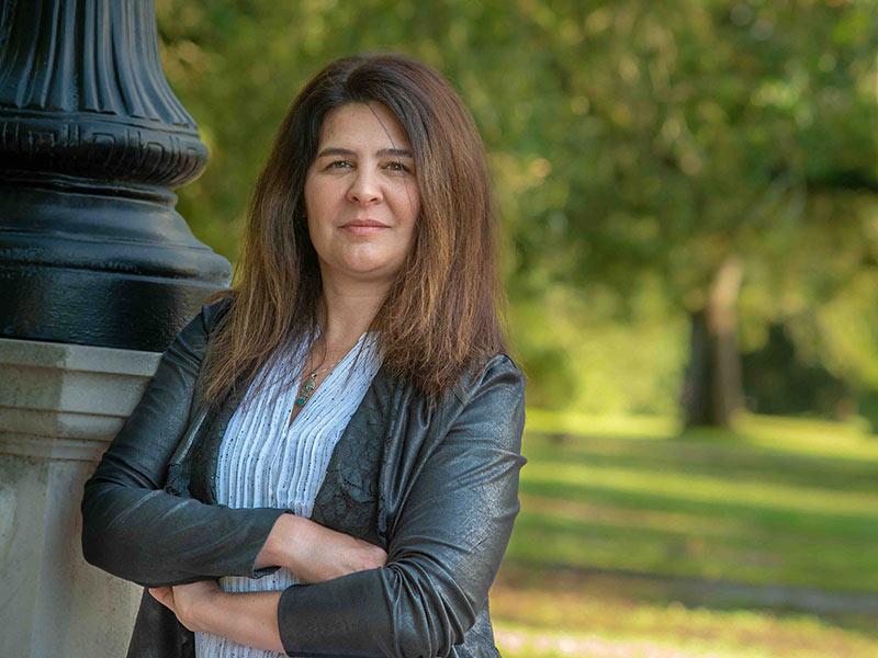 Dr. Monica Vaccari is the lead author of a new study that found having a robust initial immune response to coronavirus infection might not be helpful in fighting off the virus. (Photo by Sally Asher) Dr. Monica Vaccari is the lead author of a new study that found having a robust initial immune response to coronavirus infection might not be helpful in fighting off the virus. (Photo by Sally Asher)