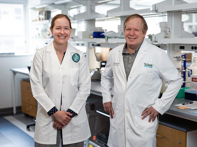 The vaccine’s inventors Elizabeth Norton, PhD, associate professor of microbiology and immunology, and Jay Kolls, MD