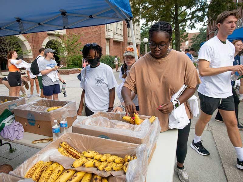 Healthy snacks are provided for volunteers as they head out to the various service locations. Over 850 students signed up to volunteer.