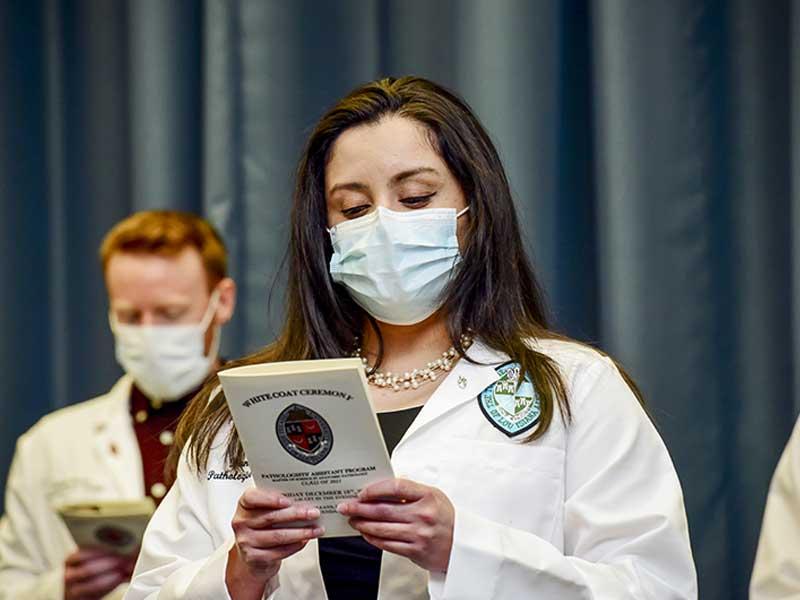 Daniela Rodriguez reads the Oath of the Pathologists’ Assistant Program Daniela Rodriguez reads the Oath of the Pathologists’ Assistant Program