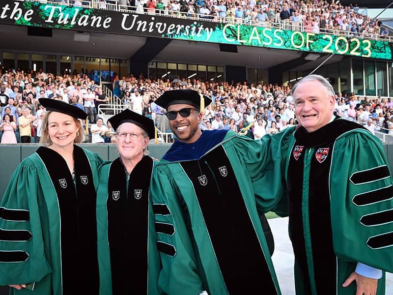 Dr. Rosalind Picard, an inventor, engineer, scientist and pioneer in artificial intelligence, Quint Davis, producer of the New Orleans Jazz and Heritage Festival, Leslie Odom, Jr., and President Michael Fitts pose for a photo. Picard, Davis and Odom were 