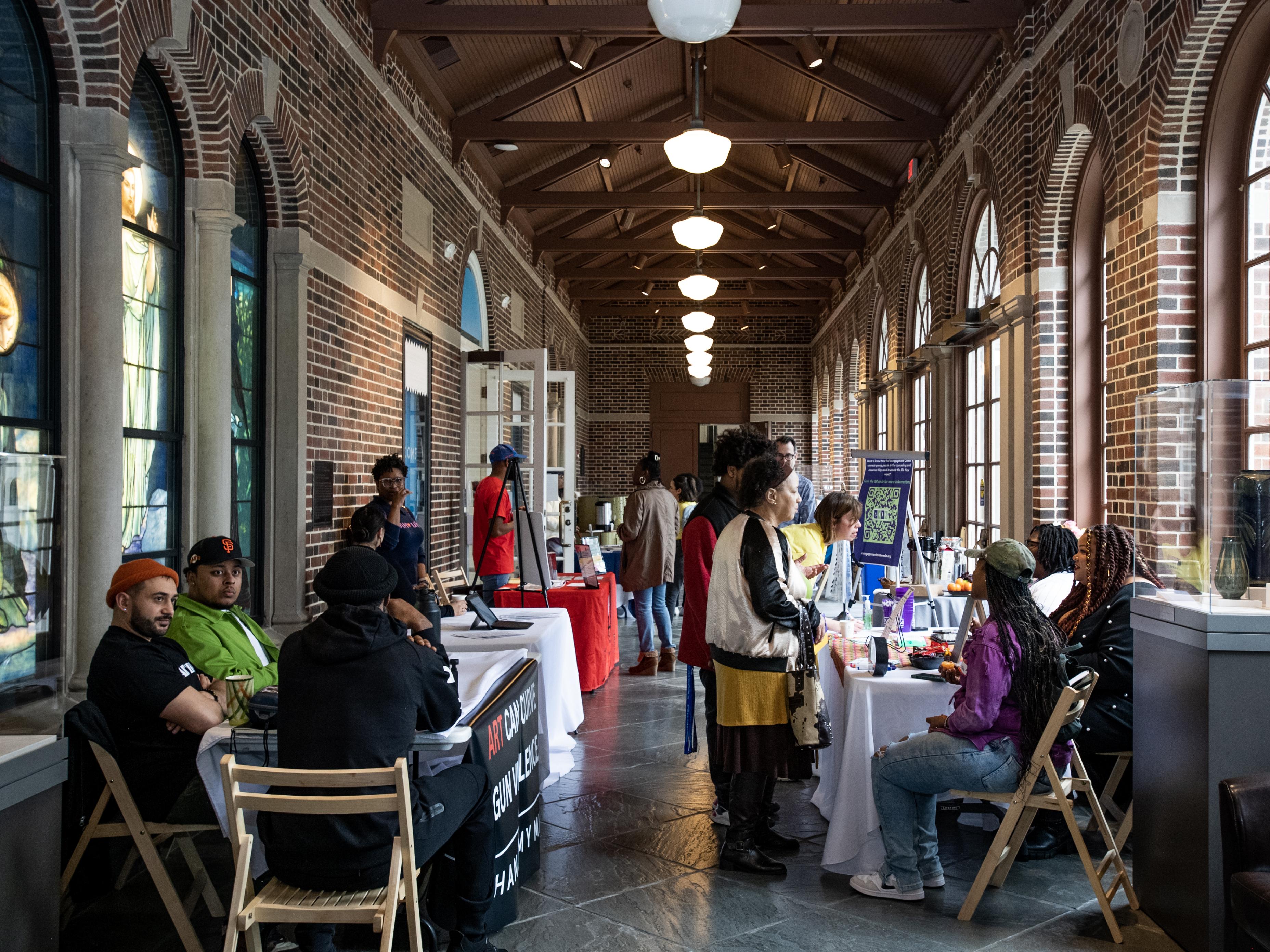 In the Woodward Way breezeway, various youth advocacy organizations are on hand to offer information and resources.