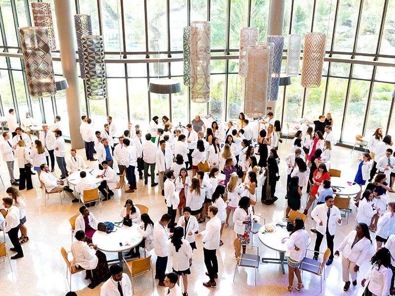 Medical students robe in the Goldring/Woldenberg Business Complex prior to the ceremony.. 