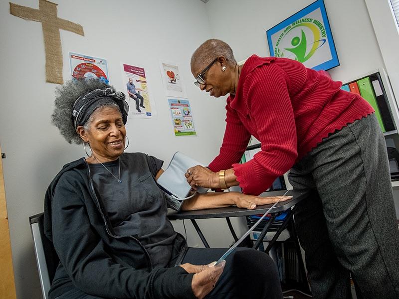 Church blood pressure check Woman gets blood pressure checked at Cornerstone United Methodist Church in New Orleans, La.