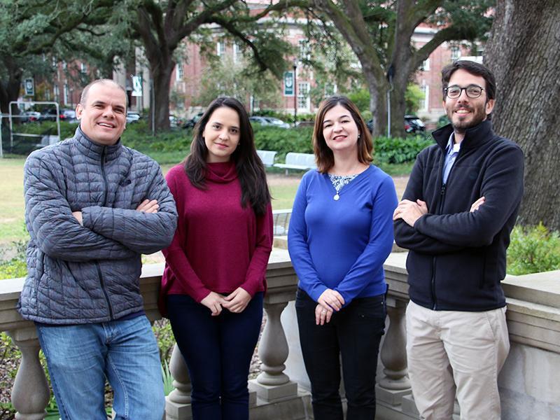 Four scholars from Brazil