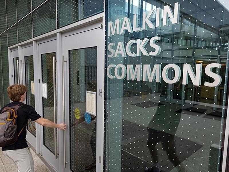 Student enters The Commons facility