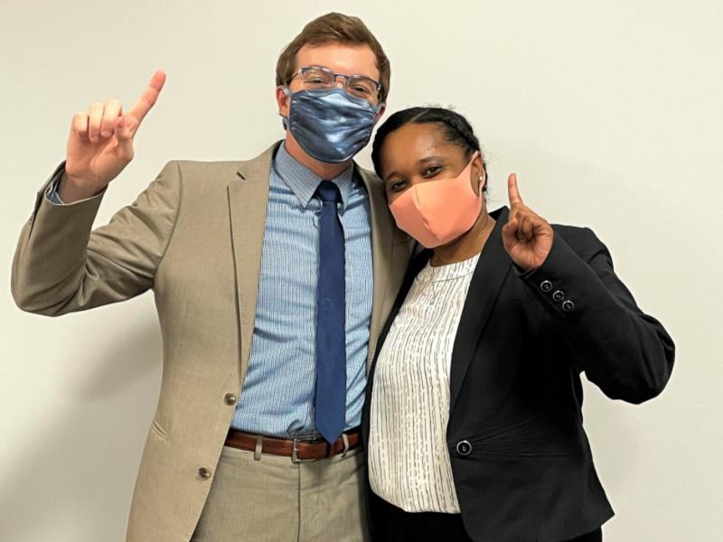 Masked students Dylan Farrow and Jayde Encalade pose for photo
