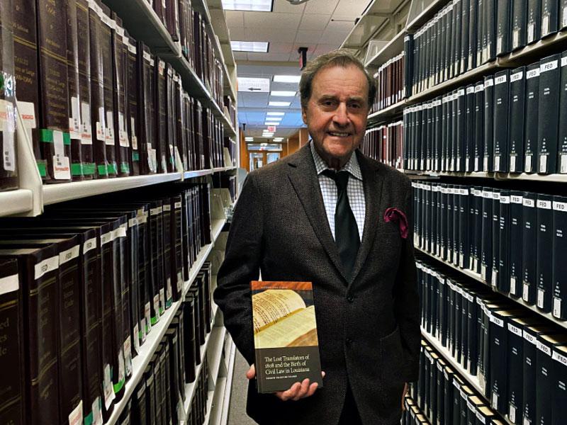 Tulane Law professor Vernon Valentine Palmer standing in law library