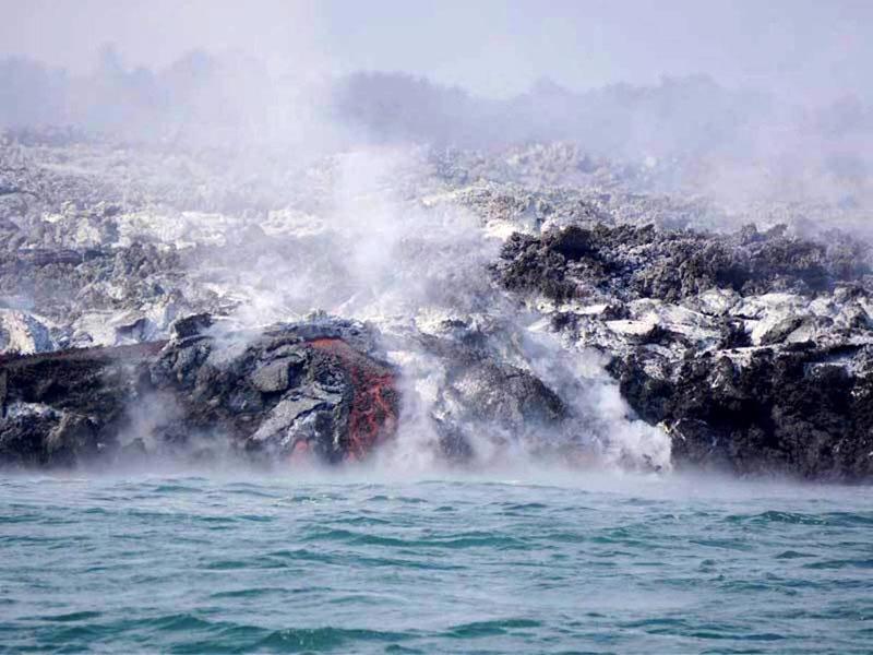 Erupting volcano in Galapagos Islands