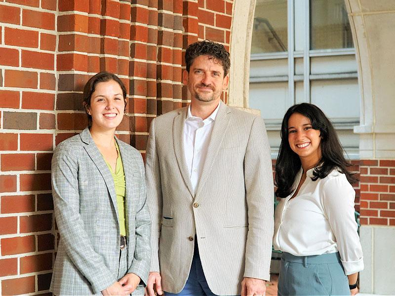 Haley Gentry (left) and Ximena De Obaldia (right) are this year’s fellows, and Christopher Dalbom (center), institute director, is a former fellow. Haley Gentry (left) and Ximena De Obaldia (right) are this year’s fellows, and Christopher Dalbom (center), institute director, is a former fellow.