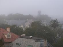 Morning fog creates a picturesque scene with old-world charm.