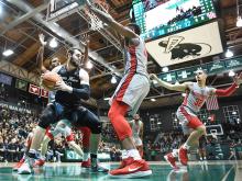 Spirited home crowd rallies Green Wave to victory over Houston Cougars.